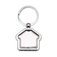 Metalowy brelok w kształcie domku, zamocowany w ramce, obrotowy, dwustronny