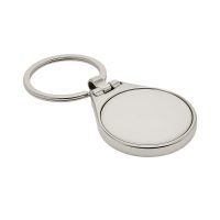 Okrągły, metalowy brelok z zawieszką