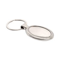 Owalny, metalowy brelok z zawieszką