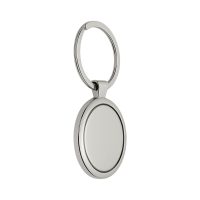 Okrągły, metalowy brelok